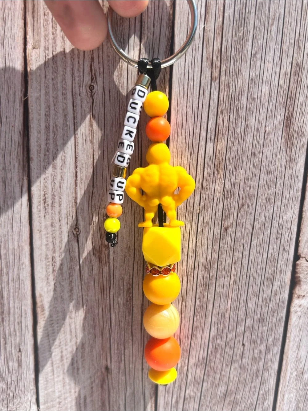 Yellow Muscular Rubber Duck Keychain with handmade letter bead strand